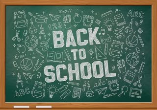 Back to school with green chalkboard background and icons of school items drawn on the blackboard with white chalk. vector illustration